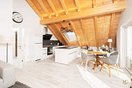 Verkauft: Dachgeschosswohnung mit atemberaubenden Deckenhöhen und Zugspitzblick – Weilheim 01